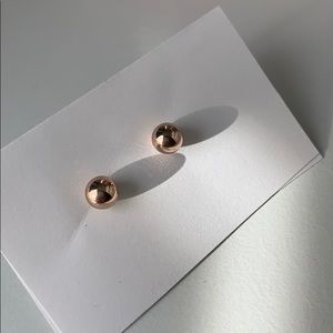 Small gold stud earrings